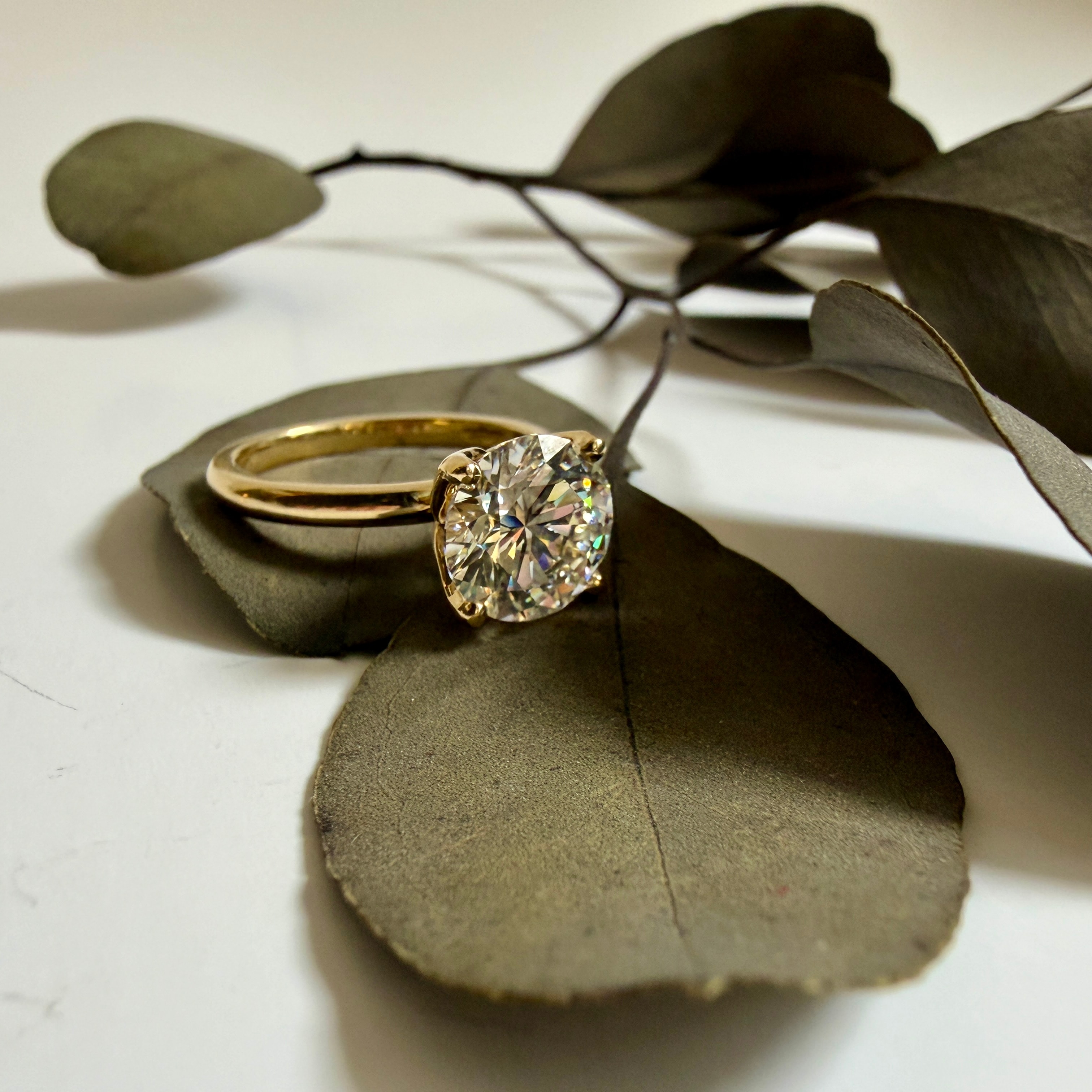 Custom gold pendant with diamond
