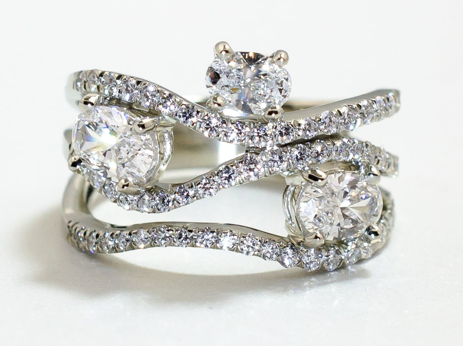 Custom wedding band with channel set diamonds