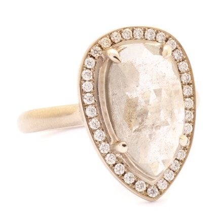 Rose gold engagement ring with pear shaped diamond