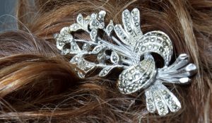 Wedding style - use a vintage brooch in your hair for something old